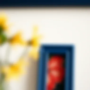 Close-up of a navy blue photo frame showcasing a vibrant artwork.