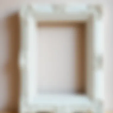 Close-up of a beautifully crafted white frame with intricate details.
