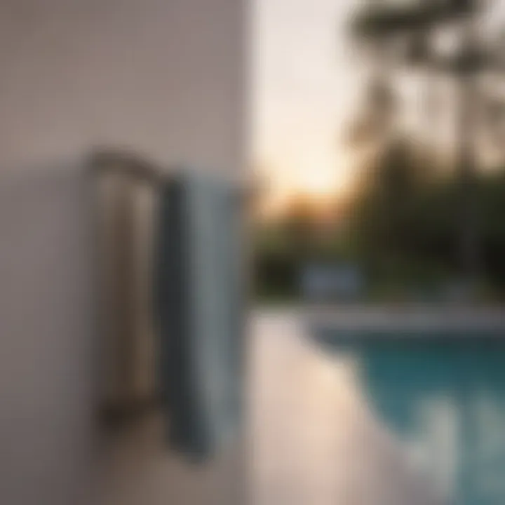 Metal towel rack with a minimalist design during sunset