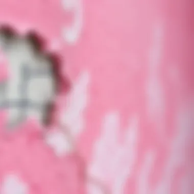 An intricate close-up of a pink and grey textured canvas highlighting color interplay