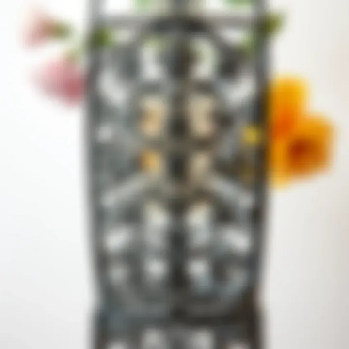 Close-up view of intricate designs on a metal flower display stand