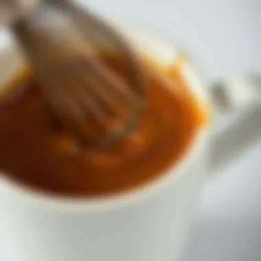 Close-up of rich, frothy coffee in a ceramic cup
