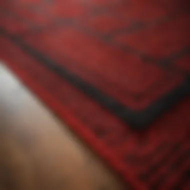 Close-up of textures and materials used in red and black rugs