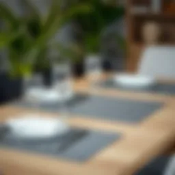 Elegant grey table mat set on a modern dining table with stylish cutlery and glassware