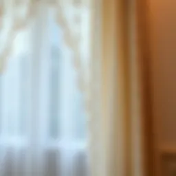 Elegant beige lace curtain draping a window